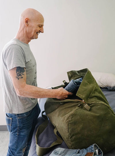 Veterans’ House Canada offers a virtual tour of the Andy Carswell Building in Ottawa, a 40-unit residence that opened in 2021. Pictured, a veteran unpacking.