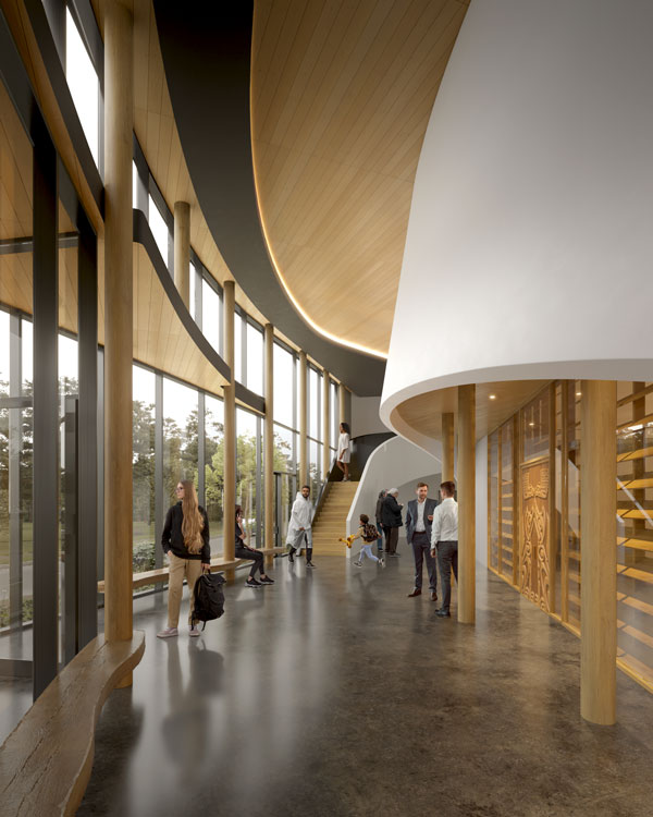 Wood is being used to bring warmth to the building and to represent the Coast Salish peoples’ culture and connection with timber. Flowing and curved wood in the interior structure represents the idea that the building is a place for moving through, says Low Hammond Rowe architect Roya Darvish.