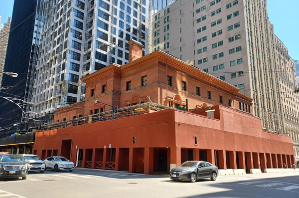 Extensive over-the-sidewalk temporary facilities were installed to permit exterior restoration work on the Toronto Club.
