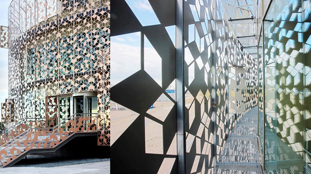 The aluminum jaali on Hispasat headquarters is installed outside the building’s exterior wall, in traditional fashion.