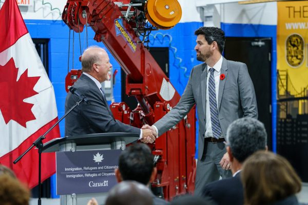 Federal Minister of Immigration Sean Fraser (right) greeted Canada’s Building Trades Unions executive director Sean Strickland during a presentation launching new immigration policy at the Finishing Trades Institute in Toronto.