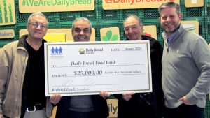RESCON helps fight hunger with Daily Bread Food Bank donation