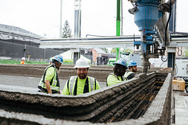 How the nidus3D system works is the concrete is delivered to the print-head which then distributes it in layers about 40-millimetres-high-by-50 or 80-millimetres wide. Each layer, which is tied together and reinforced, is completed in 12 to 20 minutes. Pictured is the structure of a basement taking shape.