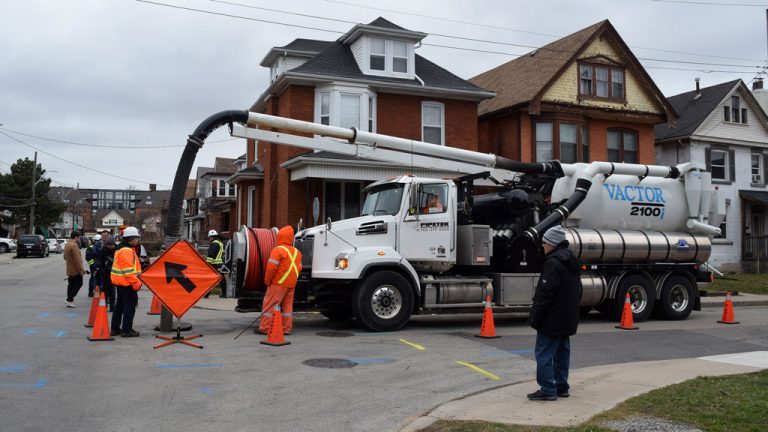 Crews sucked up sewage Jan. 10 after the discovery of cross-connected pipes in east Hamilton.