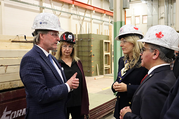 Mike Yorke, president of the Carpenters’ District Council of Ontario and Cristina Selva, executive director, College of Carpenters and Allied Trades took Minister Joly and MP Sorbara on a tour of the facility.