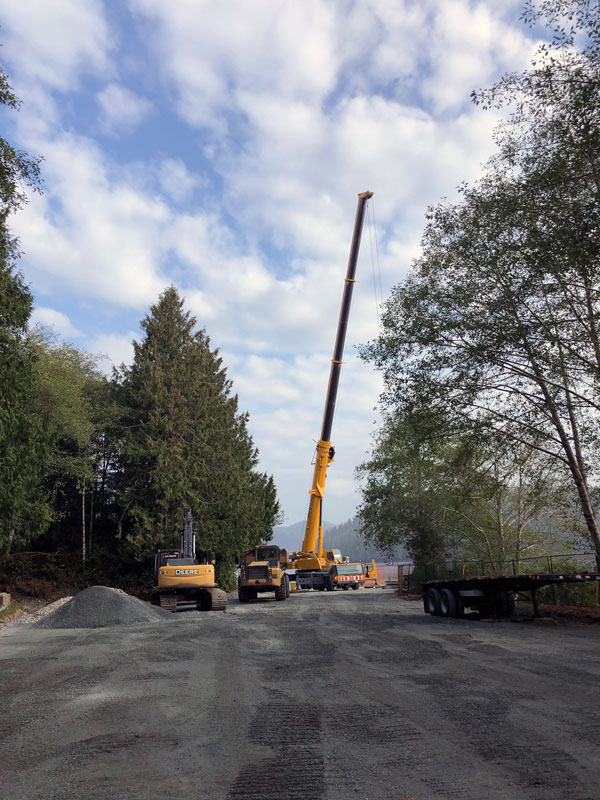 At Grice Bay on Vancouver Island Milestone Environmental Contracting Inc. employees work to remediate a ship fuelling port from the Second World War by removing old storage tanks and rebuilding a boat launch for public use.