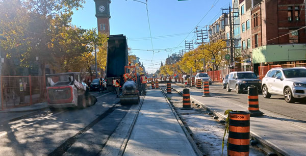 Shown here is construction in progress on College Street near Brunswick Avenue. Undertaken from September to December 2022, this carefully staged project required ripping out the aging existing tracks, breaking up the old concrete between those lines as well as in the separating median and then pouring new concrete.