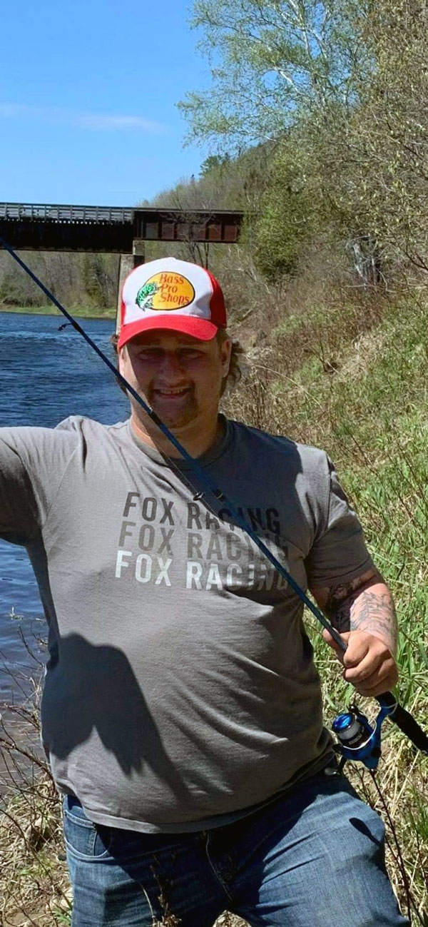 Patrick Poitras fishing with his father Marcel Poitras.