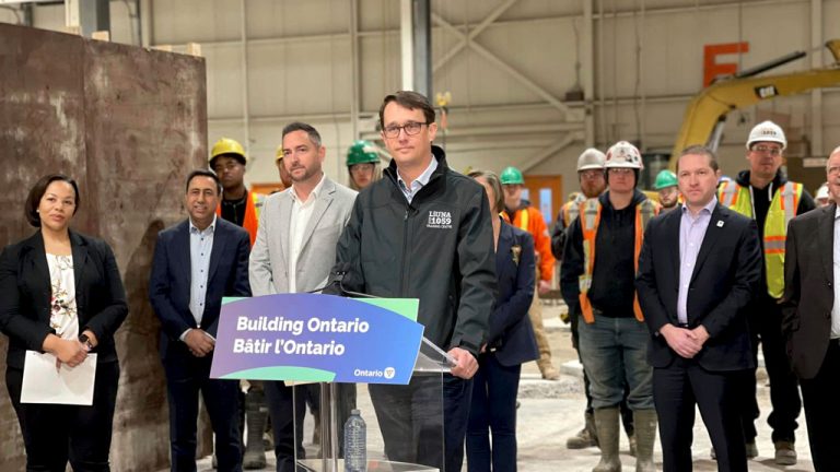 Minister of Labour, Immigration, Training and Skills Development Monte McNaughton (centre) has announced new standards for washrooms on construction jobsites.