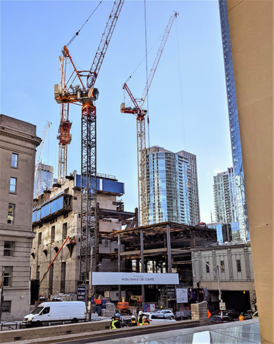 University of Toronto professor Matti Siemiatycki says developers are continuing to build even amidst storm clouds. Pictured, a downtown Toronto jobsite.