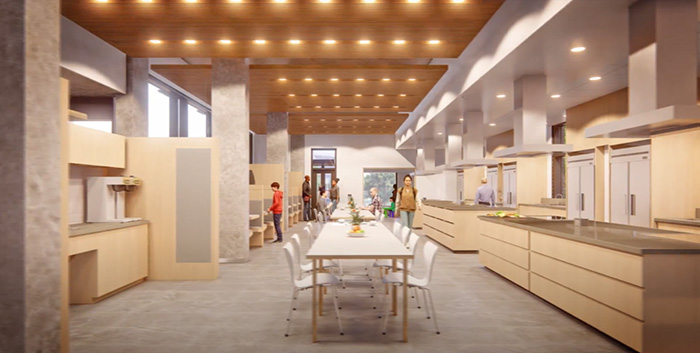 The kitchen and communal dining area features a number of cooking stations where the families can prepare meals. The space also offers little booths for the residents who are looking for some extra comfort and privacy.