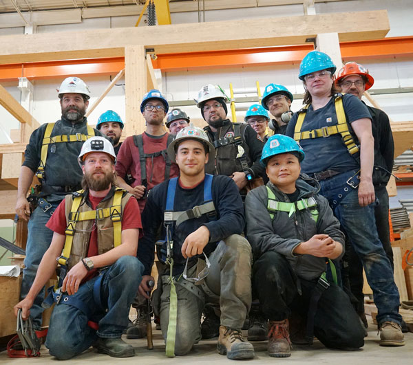 Pictured is the mass timber training class in front of a mockup module at the CCAT’s training centre in Vaughan, Ont.