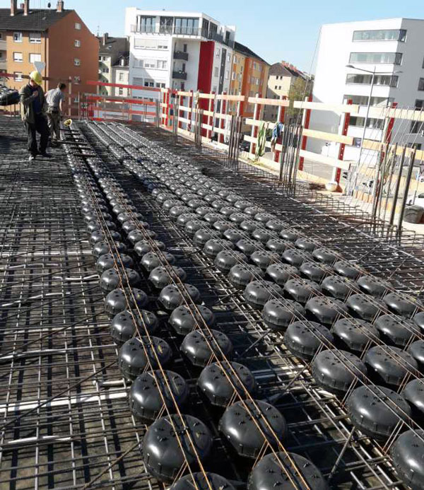 Plastic bubble modules used in the slabs of a 13-storey building in Mannheim, Germany, saved weight and reduced beam column lengths.