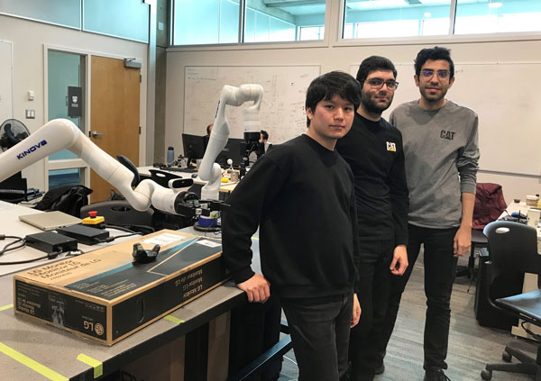 Jayden Hong, masters student, Amir Soufi, PhD, and Mehran Ghafarian Tamizi, PhD, with Kinova robotic arms being trained to program themselves.