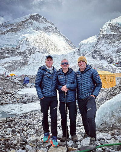 Lonnie Bedwell, centre, became the fourth blind person to ever summit Mount Everest when his expedition, which included PCL Constructors Inc.’s Mike Enter, reached the top on May 22. 