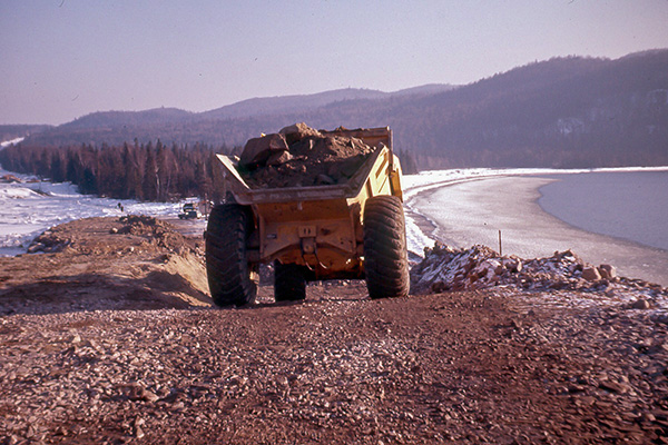 Construction of Trans-Canada Highway/Highway 17, Old Woman Bay south of Wawa, Lake Superior. Rayner Construction Ltd. Contract 1956-1959. Highway 17 was completed at Wawa in 1960.