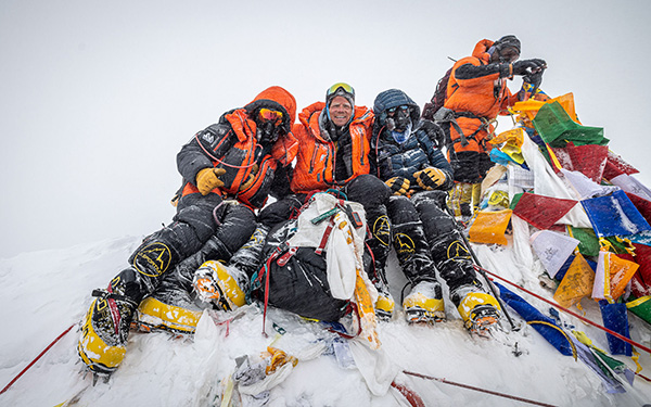 The group at the peak of Mount Everest includes blind U.S veteran Lonnie Bedwell. Bedwell runs Sightless Summits and performs great feats of adventure to inspire other veterans and civilians who live with disabilities. He is the fourth blind person to ever stand at the highest point in the world. 