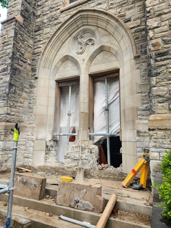 Stone alterations to the existing west doorways are carried out to lower the threshold. Work is being conducted by Heritage Restoration Inc.