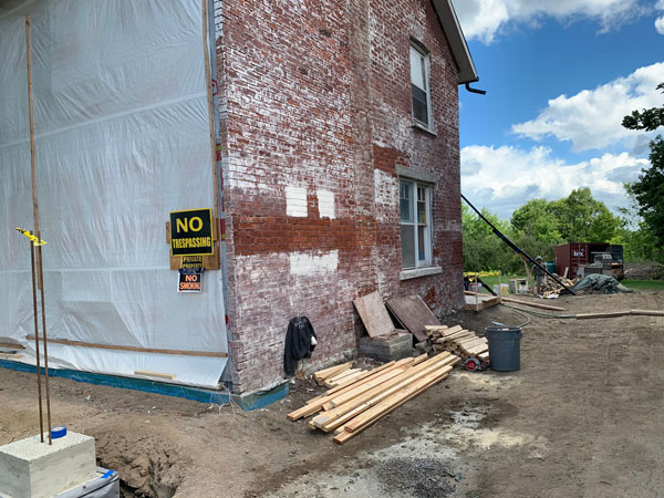 Efforts to remove the white paint from the Duffy Homestead’s bricks were unsuccessful, so the decision was made to turn the bricks around, with the inside facing out.