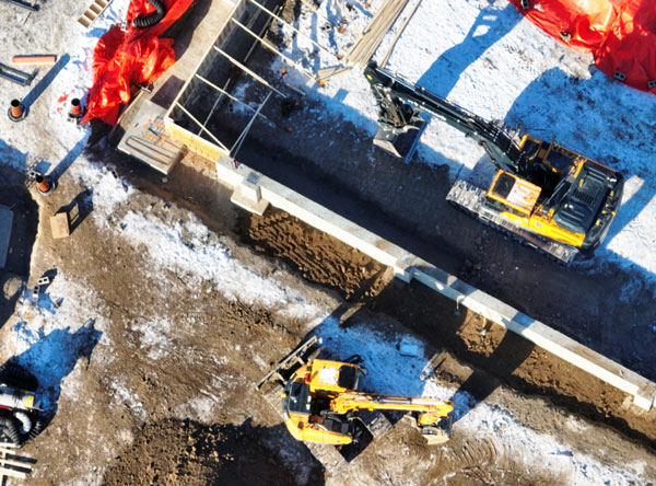 The steel superstructure of the 400,000-square-foot facility is beginning to rise and the first precast concrete section was installed recently. It will take more than 430 loads of concrete weighing 23 million pounds to build the complex, more than the weight of the Eiffel Tower.