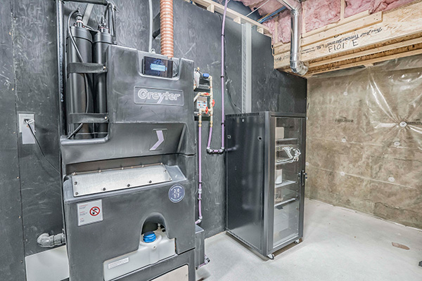 Energy features at the Summerlyn Active House include a Glow on-demand hot water system, Greyter home residential water recycling system, advanced electrode steam humidifier and heat recovery ventilator.