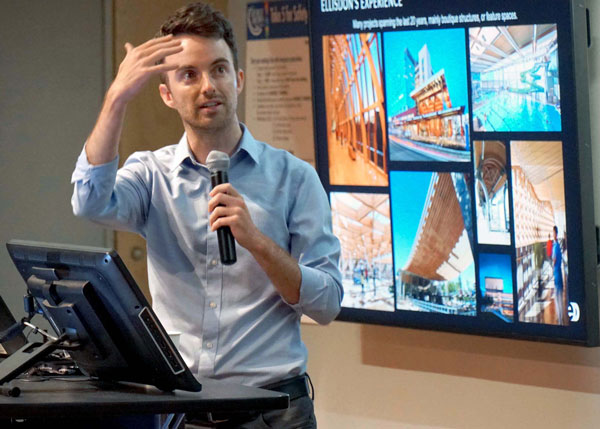 Mark Gaglione, director of building and material sciences with EllisDon, told a packed seminar recently at the Mass Timber Seminar Conference at George Brown College’s waterfront campus in downtown Toronto about the prefabricated CLT hybrid timber floor system which consists of two “trenched out” channels inlaid with post-tensioned concrete.