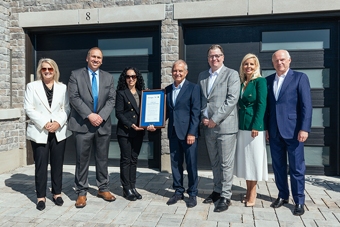 During the recent unveiling of its Active House model in Bradford, Ont., Great Gulf also announced a multi-year collaboration with Georgian College to launch the Great Gulf Innovation Award Suite, which includes four different additions to Georgian’s financial aid program designed to support innovative homebuilding skills. Tad Putyra (centre), president of Great Gulf Low Rise and Home Technology and Systems Plus, was joined by Georgian College and other Great Gulf executives.