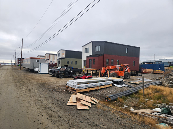 Sakku Investments Corporation conducted two pilot housing projects, one for two five-plex complexes. The buildings were assembled in a Quebec factory in Saint-Romain by Sakku’s partner RG Solution, a Quebec-based modular builder. It took about two months to complete 22 modules for the homes that were then shipped through sealift to Arviat where they were completed in about eight months.