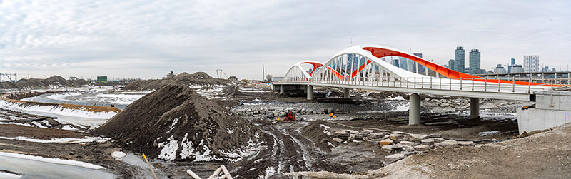 The Port Lands Flood Protection Project required four new bridges to be installed in the area east of downtown Toronto. There are two Cherry Street North Bridges. One is a vehicular bridge and one is an LRT bridge. There is also the four-span Commissioners Street Bridge and the Cherry Street South Bridge, a longer 56-metre span bridge with two approaches.