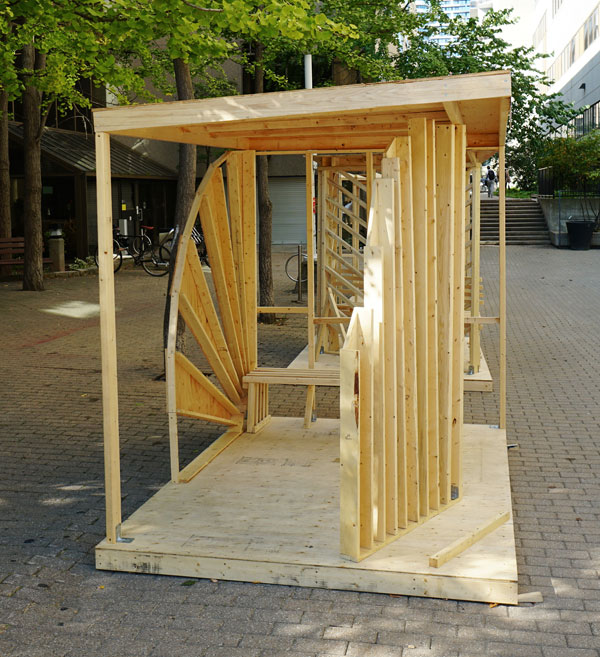 Shown is the winning bus shelter and bicycle lockup that was featured in the TimberFever competition at Toronto Metropolitan University. The concept was inspired by Chinatown and incorporated the Chinese folding fan.