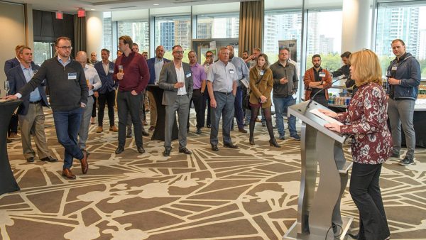 VRCA president Jeannine Martin addresses the Silver Award winners at a reception held recently in downtown Vancouver.