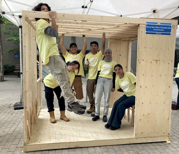 The Intermission, located on Murray Ross Parkway at Columbia Gate, was built as a bus stop located in the midst of York University. Its design takes inspiration from its surrounding environment and culture.