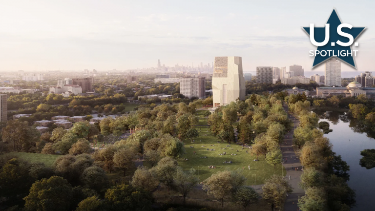 The finished museum tower in the Presidential Center campus on Chicago's south side is shown with the downtown in the distance.