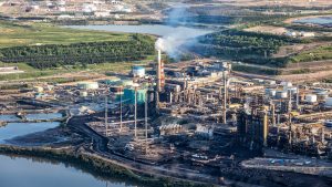 Suncor CEO says company committed to decarbonization, is accused of greenwashing