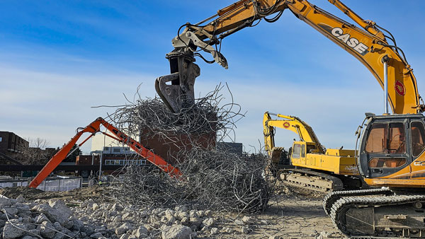 Able Demolition Services Ltd. is currently working on the last phase of the SAIT conference centre demolition as machines remove rebar from foundation concrete.