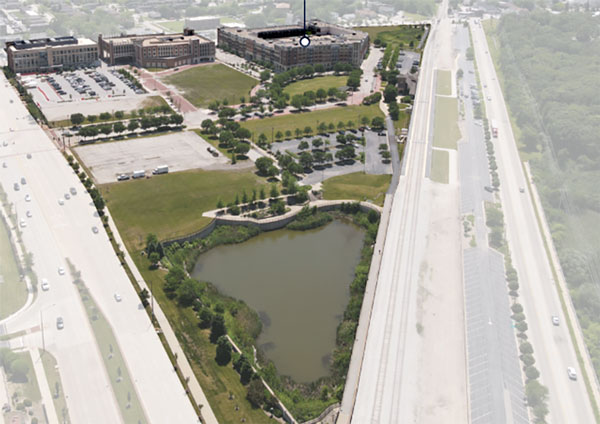 The finished development shows a water feature, park and commercial district to the south. Existing commercial and residential is further south.