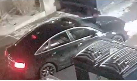 A picture of a black sedan suspected to be connected with a recent copper cable theft incident in Toronto.
