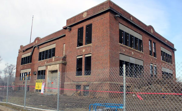 An abandoned elementary school marked the 100th commercial demolition in Detroit over past year.