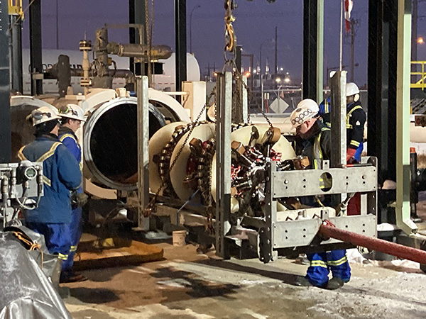 A crew at work on a section of Line 2 pipeline between Edmonton and Edson, Alta.