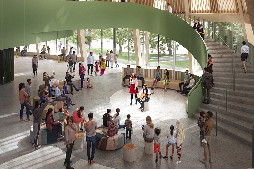 A daytime rendering of the Arts Commons Transformation shows a naturally lit transparent ground floor on the southeast corner where a gathering circle with a skylight provides space.