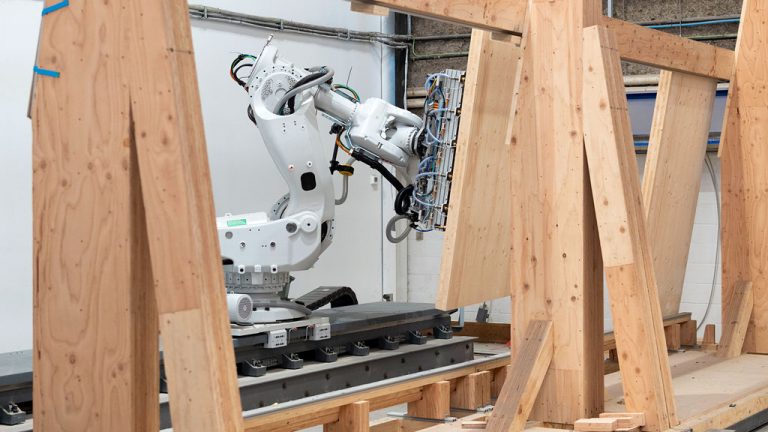 Intelligent City is a Vancouver company that produces mass timber housing. The facility uses robotics and digital technology to bring together panel design and production, two processes that are usually carried out separately and sequentially.