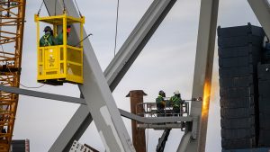 Crews carefully start to remove first piece of twisted steel from collapsed Baltimore bridge
