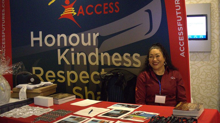 An Aboriginal Community Career Employment Services Society (ACCESS) representative at the organization’s booth at the recent BC Indigenous Apprenticeship Forum held in Burnaby, B.C.