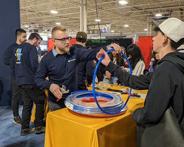 Right, Humber College plumbing instructor Aaron Rosenblum is committed to playing his part in recruiting the next generation of plumbers.