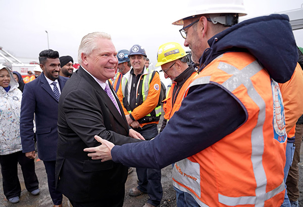 Ontario Premier Doug Ford addressed construction stakeholders in Caledon, Ont. April 30 with a bulldozer symbolically parked nearby.