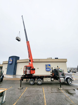 RBC’s retrofit program is planned to begin in spring 2025. Pictured, installation of heat pump HVAC unit at the Morningside and Milner Scarborough branch in Toronto.