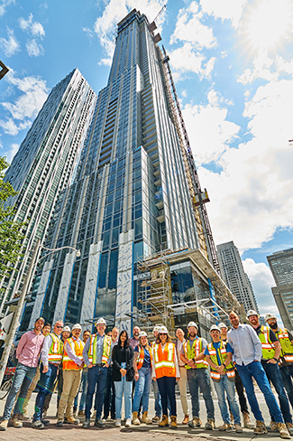 Representatives of RioCan Living, Metropia and Capital Developments gathered at their 11 Yorkville project in Toronto recently to celebrate its topping off.