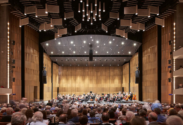 The renovated NAC in Ottawa became a space where wood was used so that it was not grey and cold, but warm and welcoming and quintessentially Canadian, says the architect.