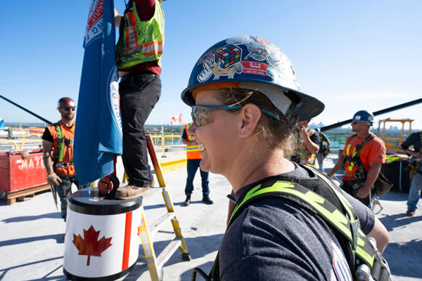 Ironworker Tracy Robinson at the crew celebration in June after the final bridge deck segment was put in place.