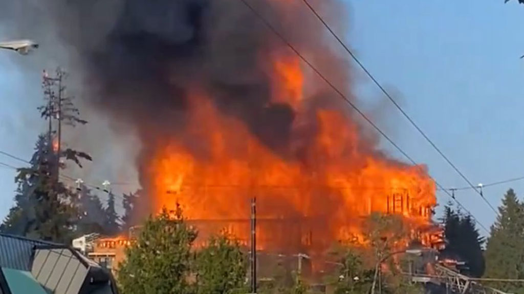 Vancouver residents displaced after major fire burns homes as crane ...